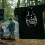 Black t-shirt with the Eau de Camping perfume bottle design