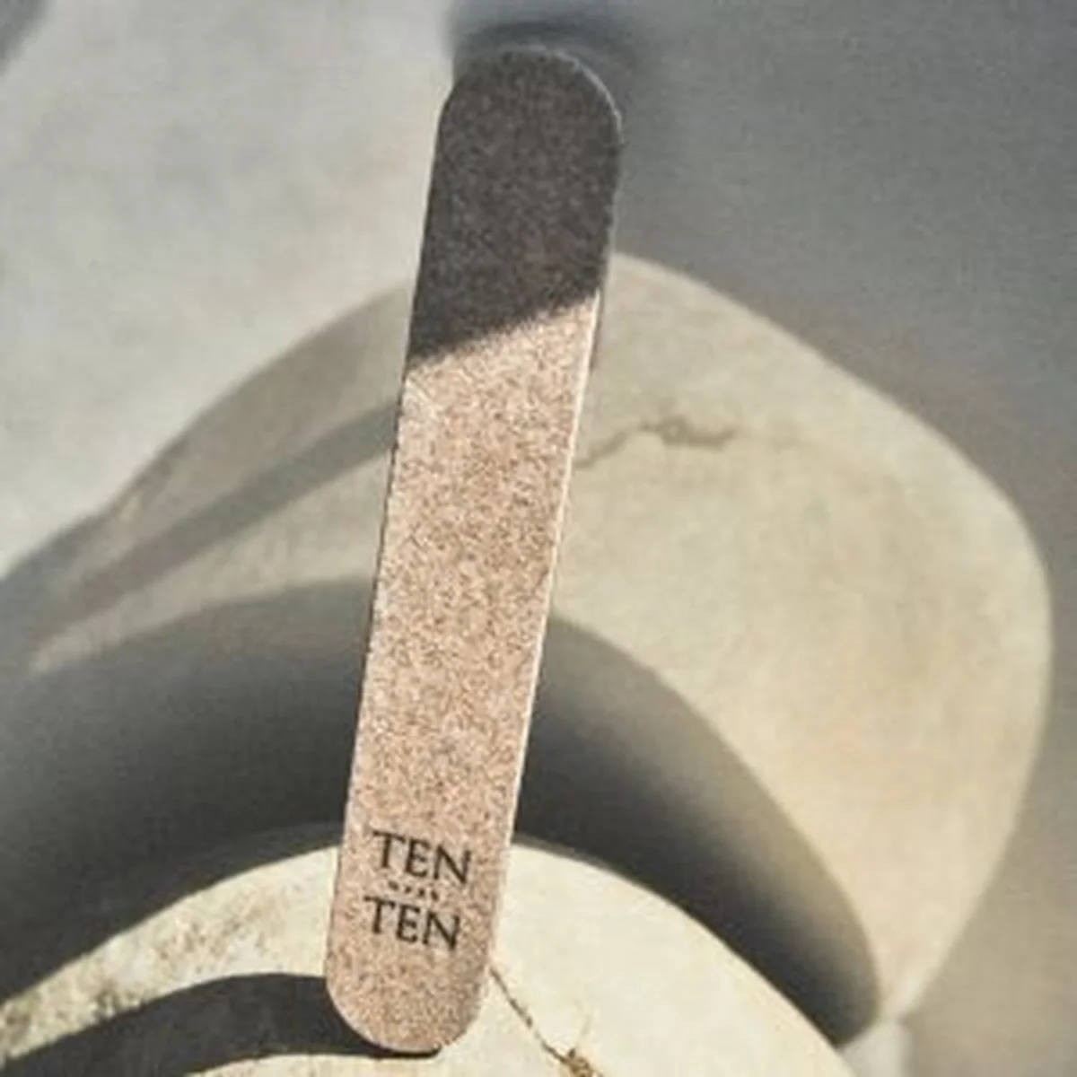TEN eco nail file in minimalist studio product shot