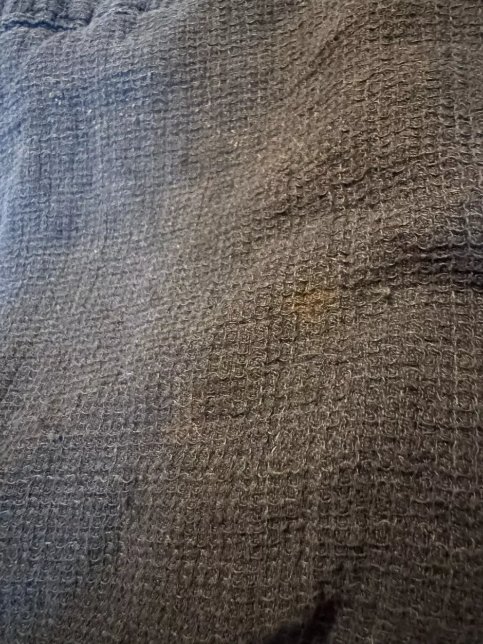 Possible bleach stains on a thrifted linen shirt